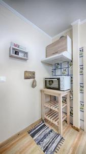 Kuchyň nebo kuchyňský kout v ubytování Feakia apartment 2 + 19 fotografií