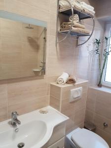 O baie la Apartman Natalia