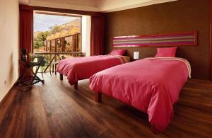 
A bed or beds in a room at Colca Trek Lodge Experience By Xima Hotels
