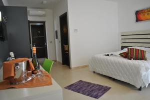 Posteľ alebo postele v izbe v ubytovaní Althea Palace Hotel