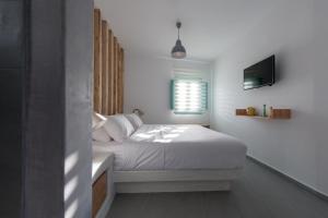 Krevet ili kreveti u jedinici u okviru objekta Avatar Suites