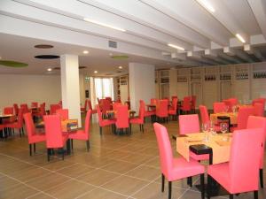 Reštaurácia alebo iné gastronomické zariadenie v ubytovaní Althea Palace Hotel
