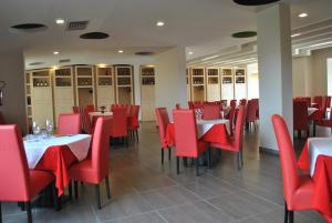 Reštaurácia alebo iné gastronomické zariadenie v ubytovaní Althea Palace Hotel