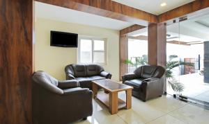 Area soggiorno di Itsy Hotels Jansi Residency