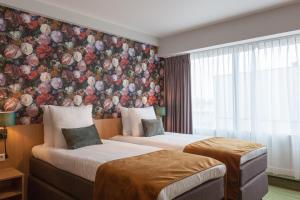 Postel nebo postele na pokoji v ubytování Best Western Plus Hotel Amstelveen
