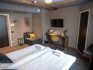 TV a/nebo společenská místnost v ubytování Hotell Gamla Staden
