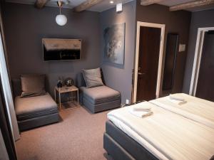 Postel nebo postele na pokoji v ubytování Hotell Gamla Staden