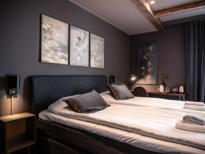 Postel nebo postele na pokoji v ubytování Hotell Gamla Staden