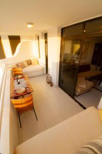 Posteľ alebo postele v izbe v ubytovaní MEDANO4YOU Red Square Dream Holiday Home