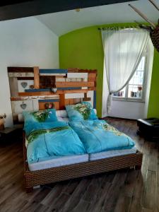 Postel nebo postele na pokoji v ubytování Apartments in Villa Crusca