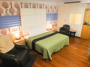 Postel nebo postele na pokoji v ubytování Dong Zhi Gang Motel