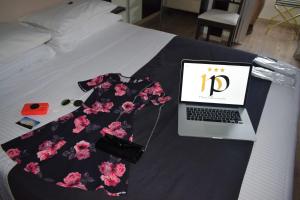 Postel nebo postele na pokoji v ubytování Hotel Perugino