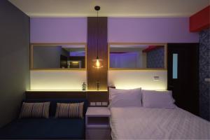 Voodi või voodid majutusasutuse 愛丁堡集團市區精品及國王雙館民宿Edinburgh Boutique Hotel toas