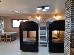 Krevet ili kreveti na sprat u jedinici u okviru objekta La Masion Benie
