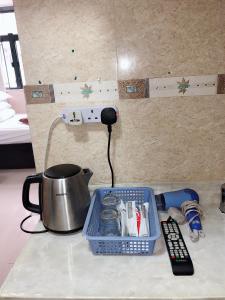 Kuchyň nebo kuchyňský kout v ubytování Hung Fai Guest House