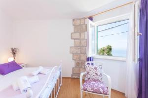 Posteľ alebo postele v izbe v ubytovaní Holiday house Layla in Tucepi, sea view