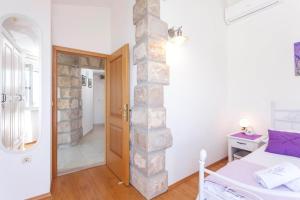 Posteľ alebo postele v izbe v ubytovaní Holiday house Layla in Tucepi, sea view