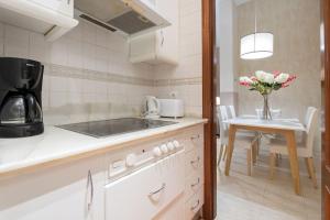 A kitchen or kitchenette at Abades Cathedral Oasis