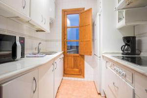 A kitchen or kitchenette at Abades Cathedral Oasis