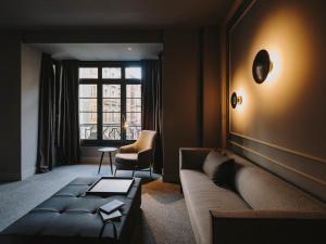 Uma área de estar em El Môderne Hotel