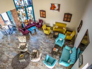 an overhead view of a living room with colorful furniture at Remer Hotel in Fethiye