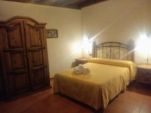 Posteľ alebo postele v izbe v ubytovaní Hotel Villa de Berzocana