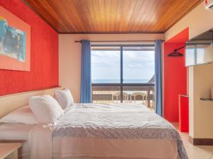 Ένα ή περισσότερα κρεβάτια σε δωμάτιο στο Happy Hotel Praia Azul +115 φωτογραφίες
