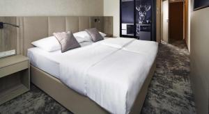 Ein Bett oder Betten in einem Zimmer der Unterkunft OREA Hotel Pyramida Praha