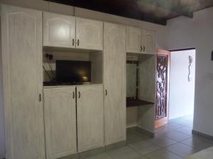 Кухня или мини-кухня в HAPPY PLACE @ 3
