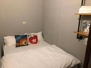 Letto o letti in una camera di 一個好人民宿 青年旅舍衛浴共用的超級小隔間 花蓮縣民宿2410號