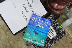two books sitting on top of a table at Lucina's in San Ignacio
