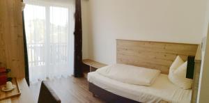 Krevet ili kreveti u jedinici u okviru objekta Hotel Jagdhof