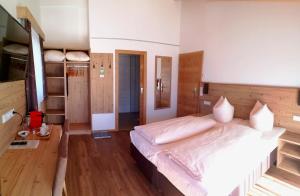 Krevet ili kreveti u jedinici u okviru objekta Hotel Jagdhof