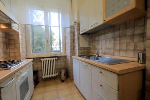 Kuchyňa alebo kuchynka v ubytovaní Accademia Apartment