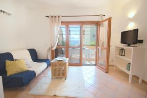 TV a/nebo společenská místnost v ubytování Homey Experience - Green Design Apartment