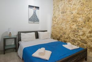 Ένα ή περισσότερα κρεβάτια σε δωμάτιο στο Veranda Apartment
