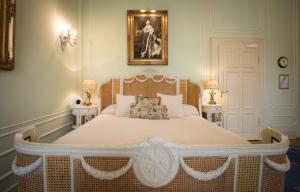 Postel nebo postele na pokoji v ubytování Hotel Belle Epoque