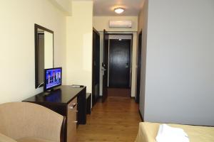 TV a/nebo společenská místnost v ubytování Hotel Nord