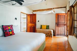 Postel nebo postele na pokoji v ubytování Zamas Hotel