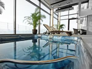 Bazén v ubytovaní Hotel Fajkier alebo v jeho blízkosti