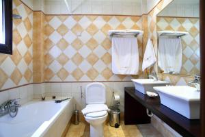 Koupelna v ubytování Hotel Tesoro