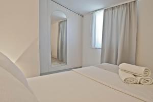 Cama o camas de una habitación en Apartments LIMIA