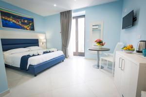 Postel nebo postele na pokoji v ubytování Relais Kaora GUESTHOUSE