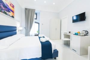 Postel nebo postele na pokoji v ubytování Relais Kaora GUESTHOUSE