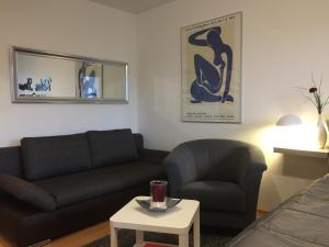 Posezení v ubytování Comfort-Apartment