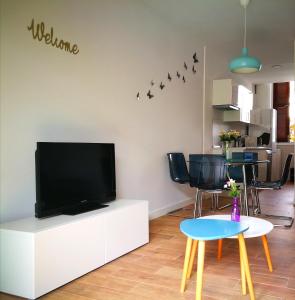 TV a/nebo společenská místnost v ubytování Tenerife House Playa de las Américas