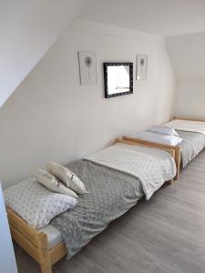 Posteľ alebo postele v izbe v ubytovaní Domek Mazury Harsz