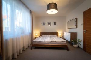 מיטה או מיטות בחדר ב-Villa Jochmann