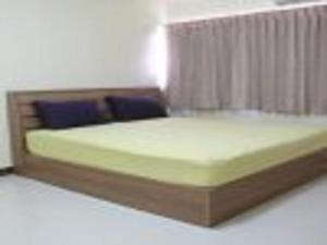 
IMPACT Muang Thong Thani Service Condominium 객실 침대
