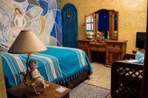 TV a/nebo společenská místnost v ubytování Hacienda Boutique B&B and Spa Solo Adultos